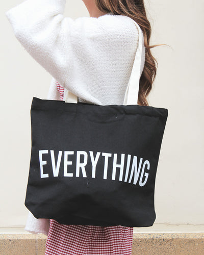 Black bag with white writing which states, "EVERYTHING"