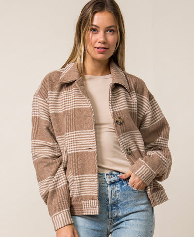 brown checker jacket on girl