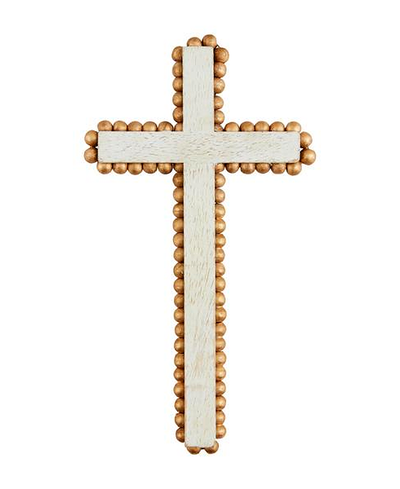 Wooden cross with beaded border on a white background