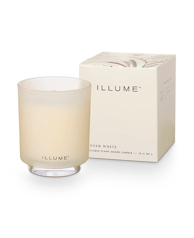 Illume candle and packaging on a white background