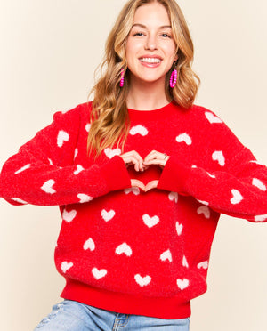 heart sweater on girl shop all sweaters here