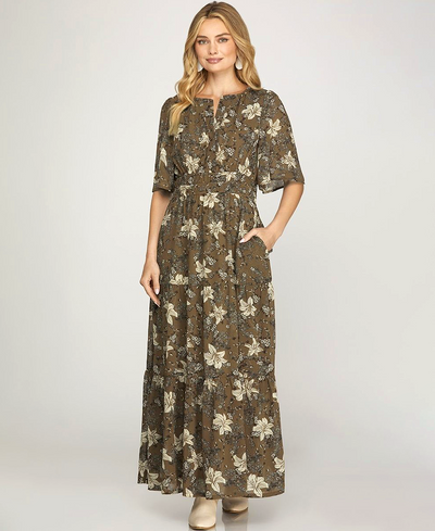 Woman wearing a floral dress on a white background