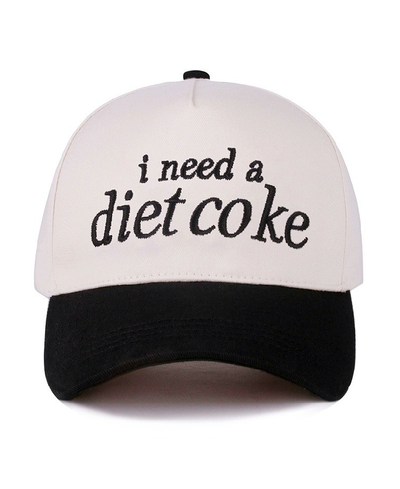 White cap with black text 'i need a diet coke' on a white background
