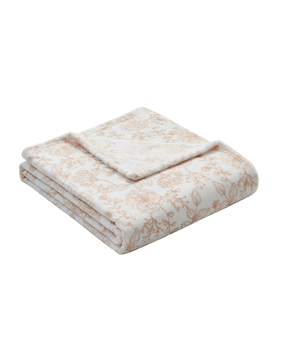 Floral patterned blanket on a white background
