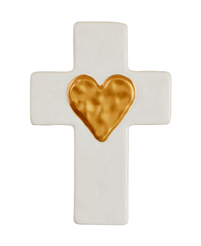 White cross with a gold heart in the center on a white background