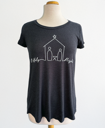 Dark gray t-shirt with a white nativity scene design on a mannequin against a white background