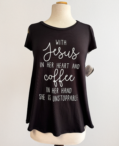 Black t-shirt with motivational quote on a mannequin against a white background