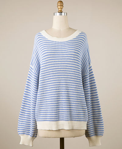Blue and white striped sweater on a mannequin against a beige background