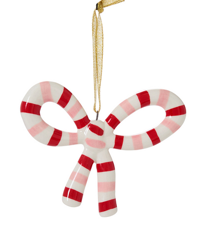 Candy cane-shaped ornament with red and white stripes on a gold ribbon against a white background