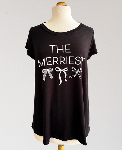 Black t-shirt with 'THE MERRIEST' text and bow graphics on a mannequin against a white background