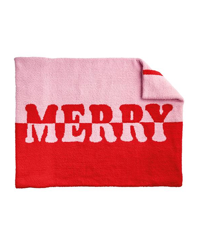 Pink and red blanket with 'MERRY' text on a white background