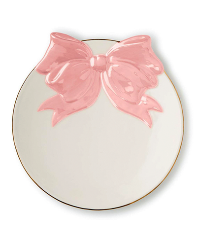 Round ceramic plate with a pink bow on a white background