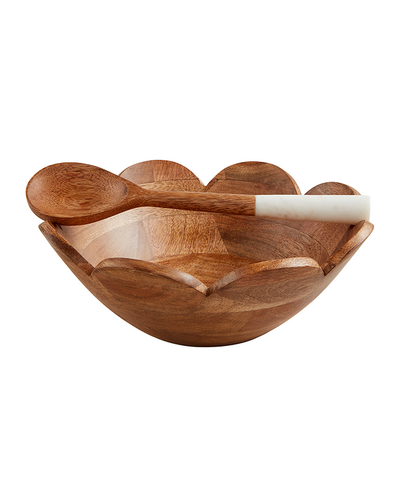 Wooden bowl with a spoon on a white background