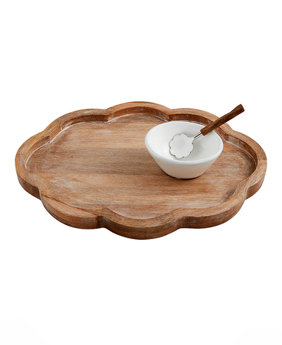 Wooden tray with a white bowl and wooden spoon on a white background