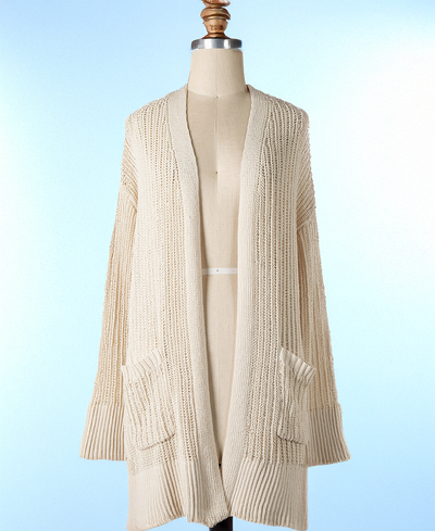 Beige knitted cardigan on a mannequin against a light blue background