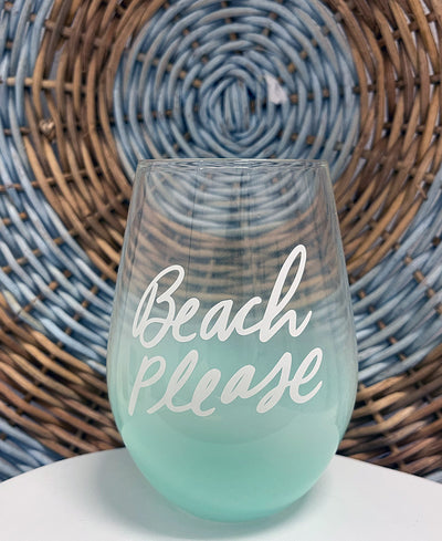 Wine glass with turquoise bottom. Glass reads, "Beach Please."