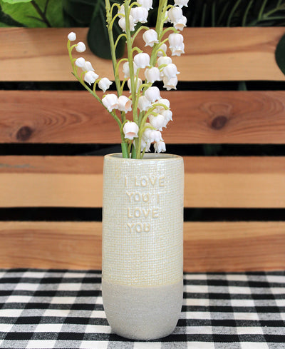 Vase that says "I love you I love you"