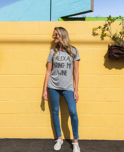 Grey T-shirt that reads, "Alexa bring me wine."